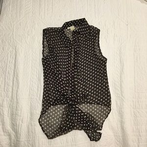 Black top with white polka dots and tie bottom